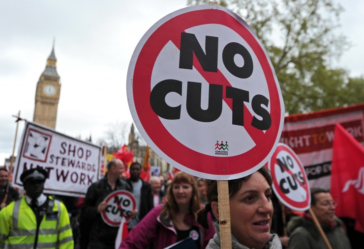 Striking public sector workers march in protest through central London, on May 10, 2012. Hundreds of thousands of British public sector workers were set to strike over pensions Thursday and police were due to protest against Prime Minister David Cameron's austerity measures.